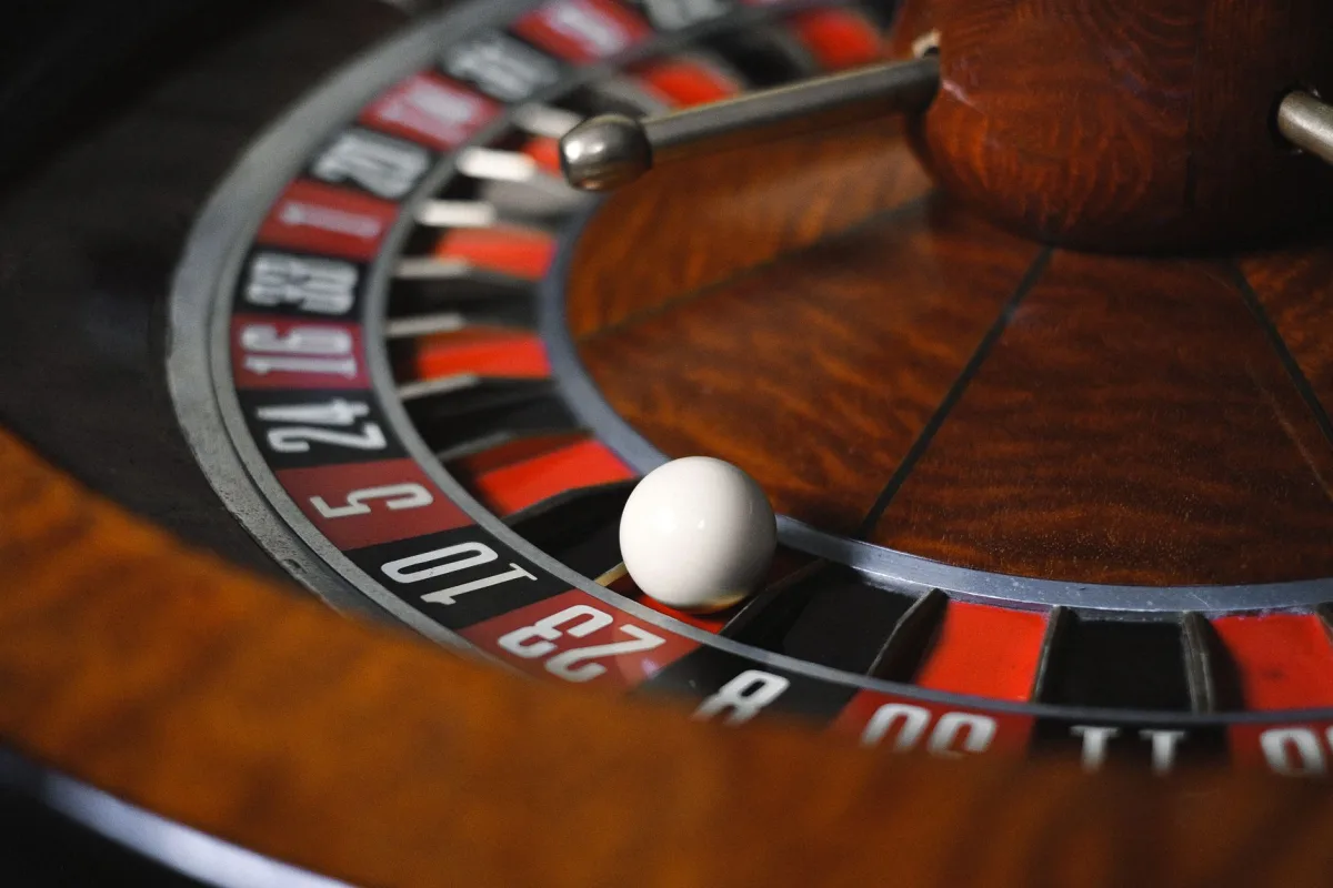Roulette wheel spinning at a live casino table